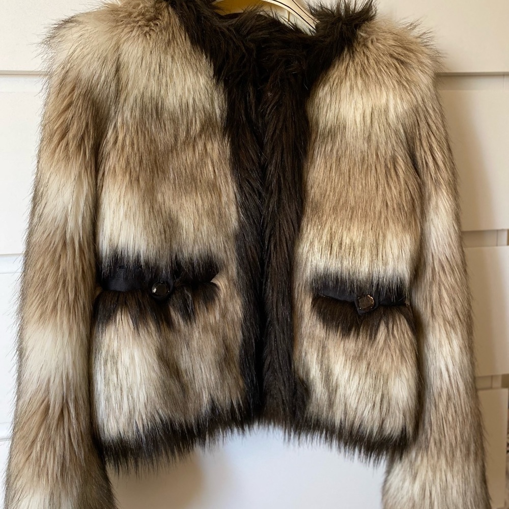 Beautiful faux fur jacket, very elegant and stylish. Only wore once.